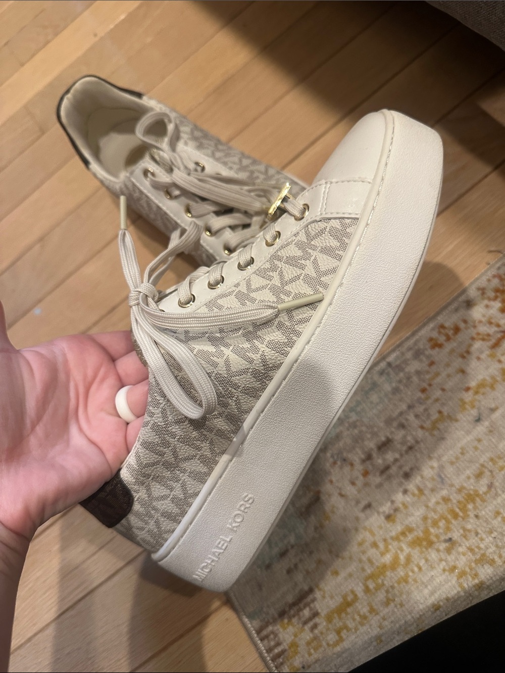 Michael Kors Cream and Gold MK Logo Low-Top Sneakers - Picture 2 of 12